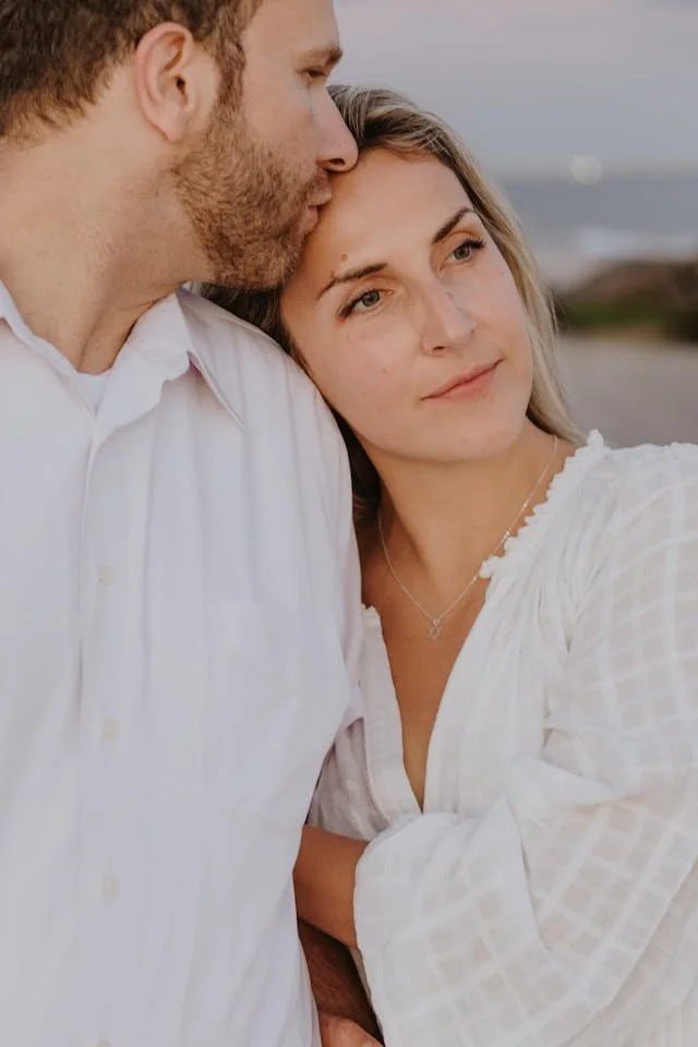 A couple and the woman is looking away