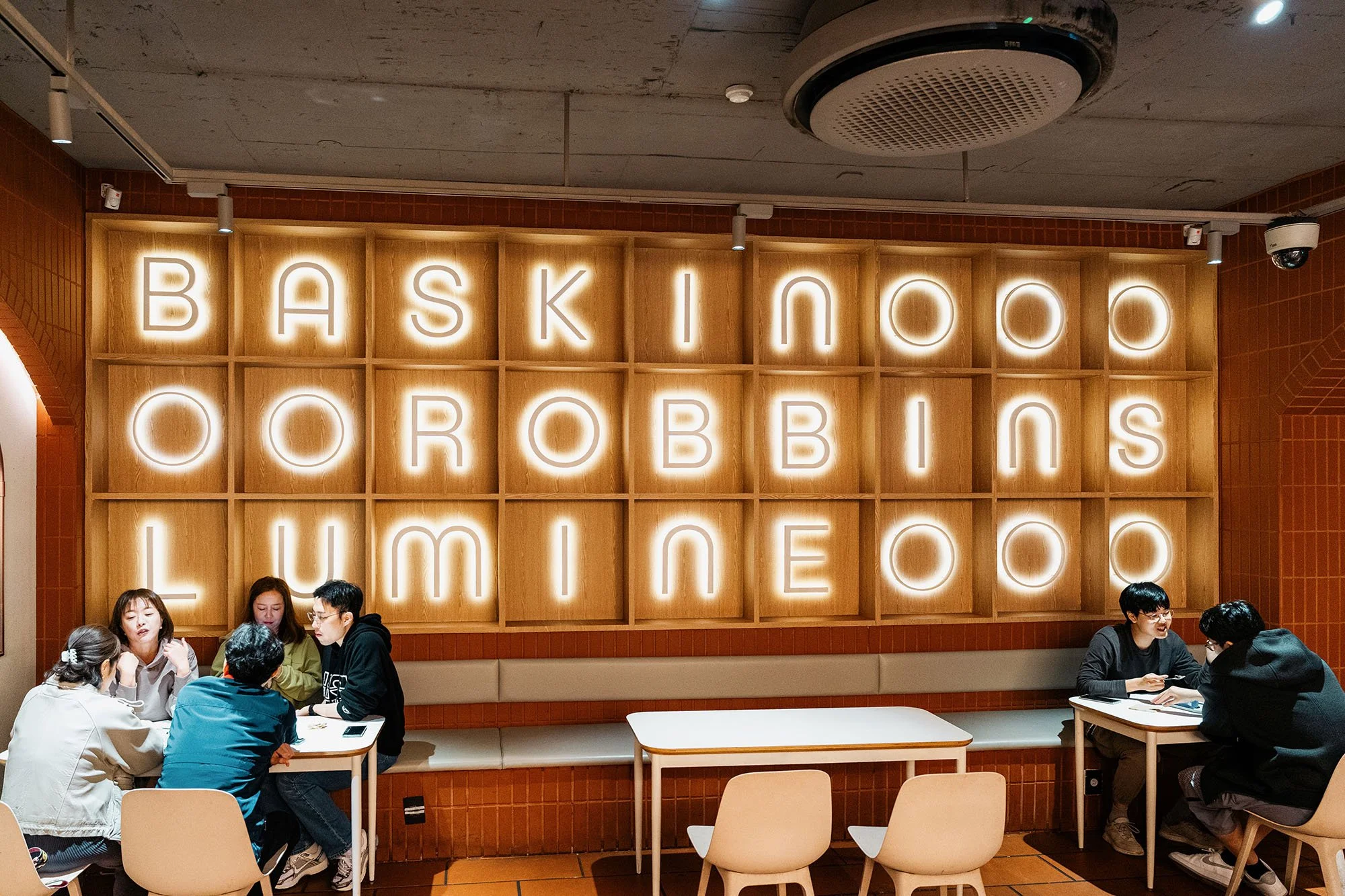 Illuminated shop wall