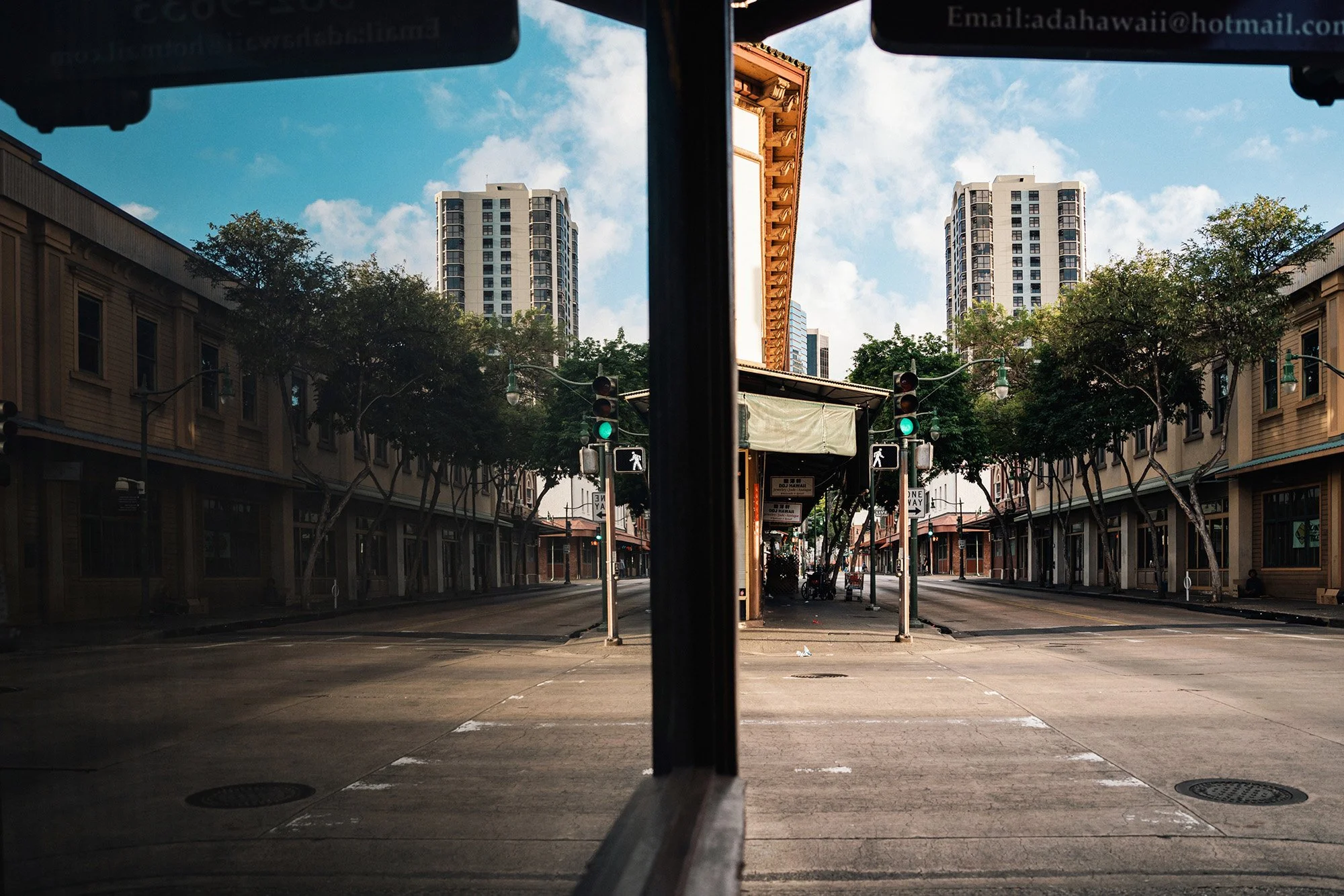 Window glass reflection in Chinatown, Honolulu
