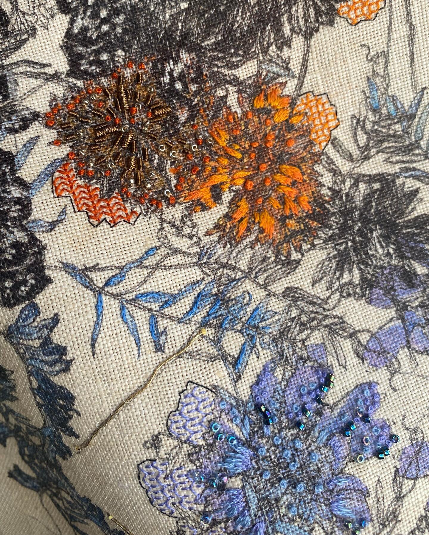 These butterfly petals have been sensitively hand embroidered using a variety of historical techniques including some very clever blackwork in purple and orange @lucymartinembroidery #handembrouderedtextiles #luxury #couturetextiles #personalisation 