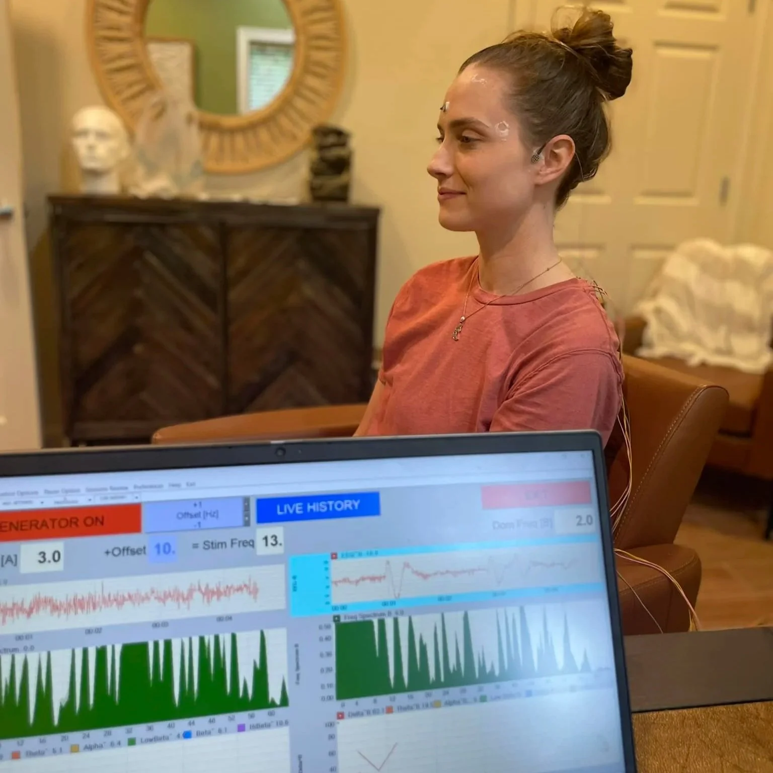 Patient doing a session of Microcurrent Neurofeedback in Baldwin County