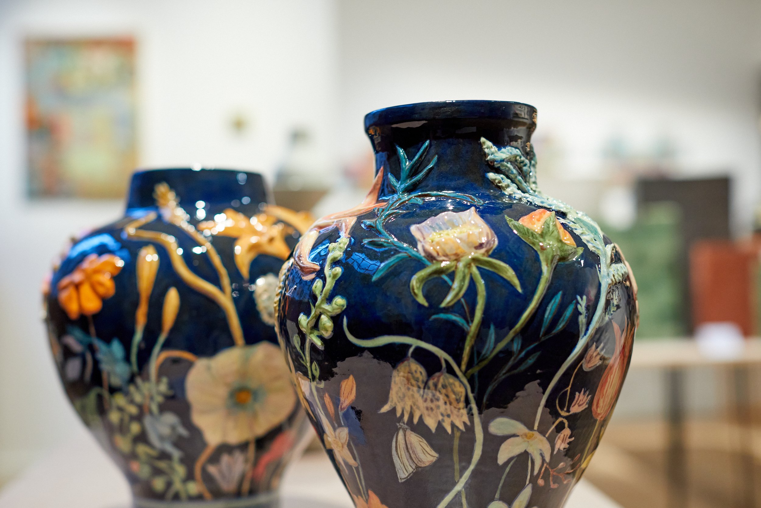 Henrietta MacPhee, ‘Dutch Flowers with Butterfly’, 2024, Glazed Ceramic, 31 x 25 cm and; ‘Dutch Flowers with Snail’, 2024, Glazed Ceramic, 32 x 23cm