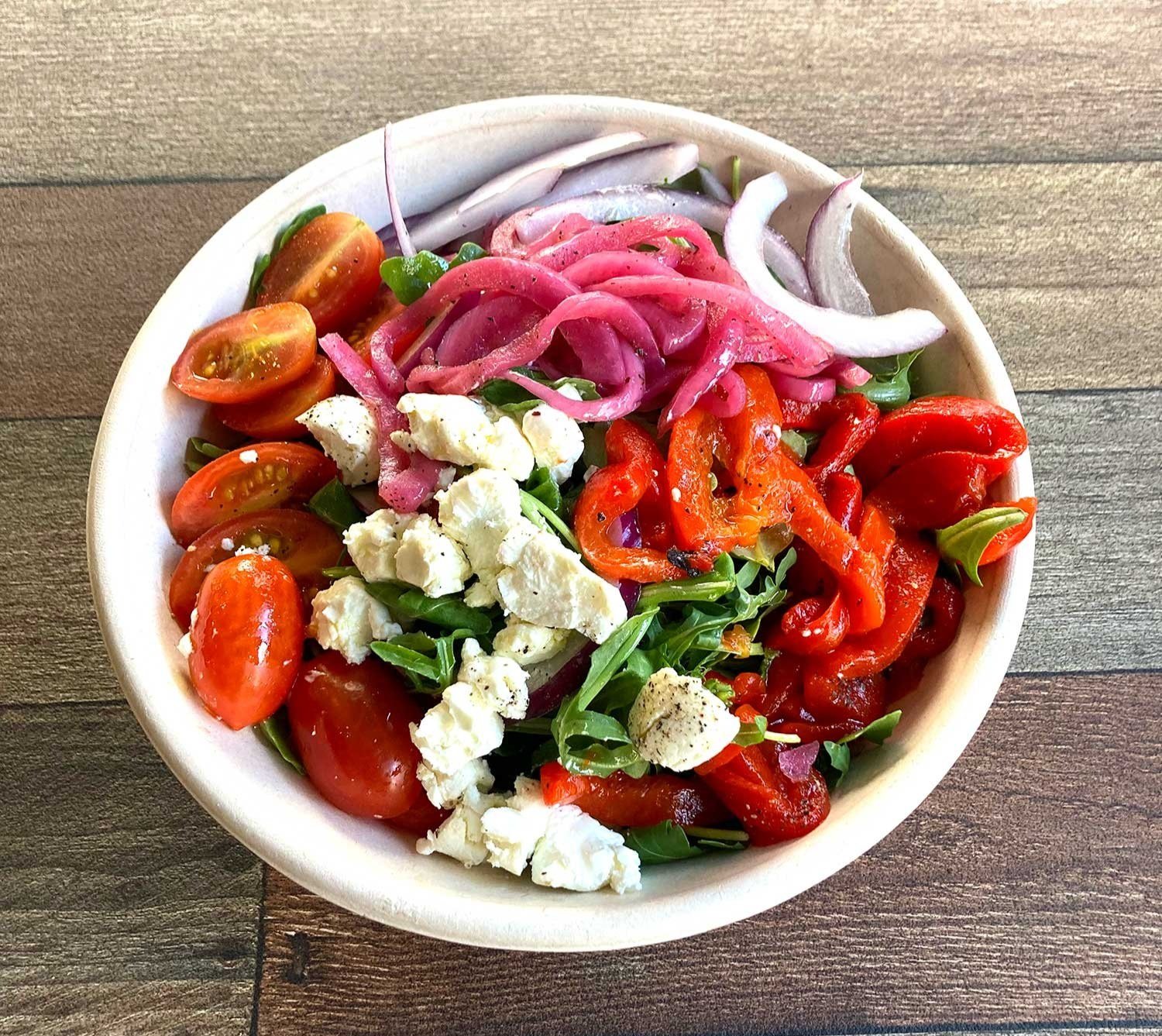 Our freshly made Arugula Salad.