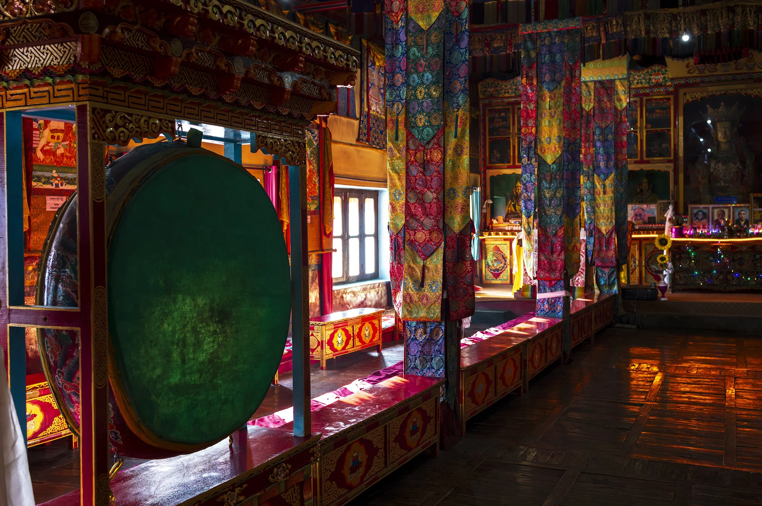Light spilling into the main Diskit monastery temple at day break. I got permission to photography this colour-soaked room, but morning prayers took place in a smaller temple