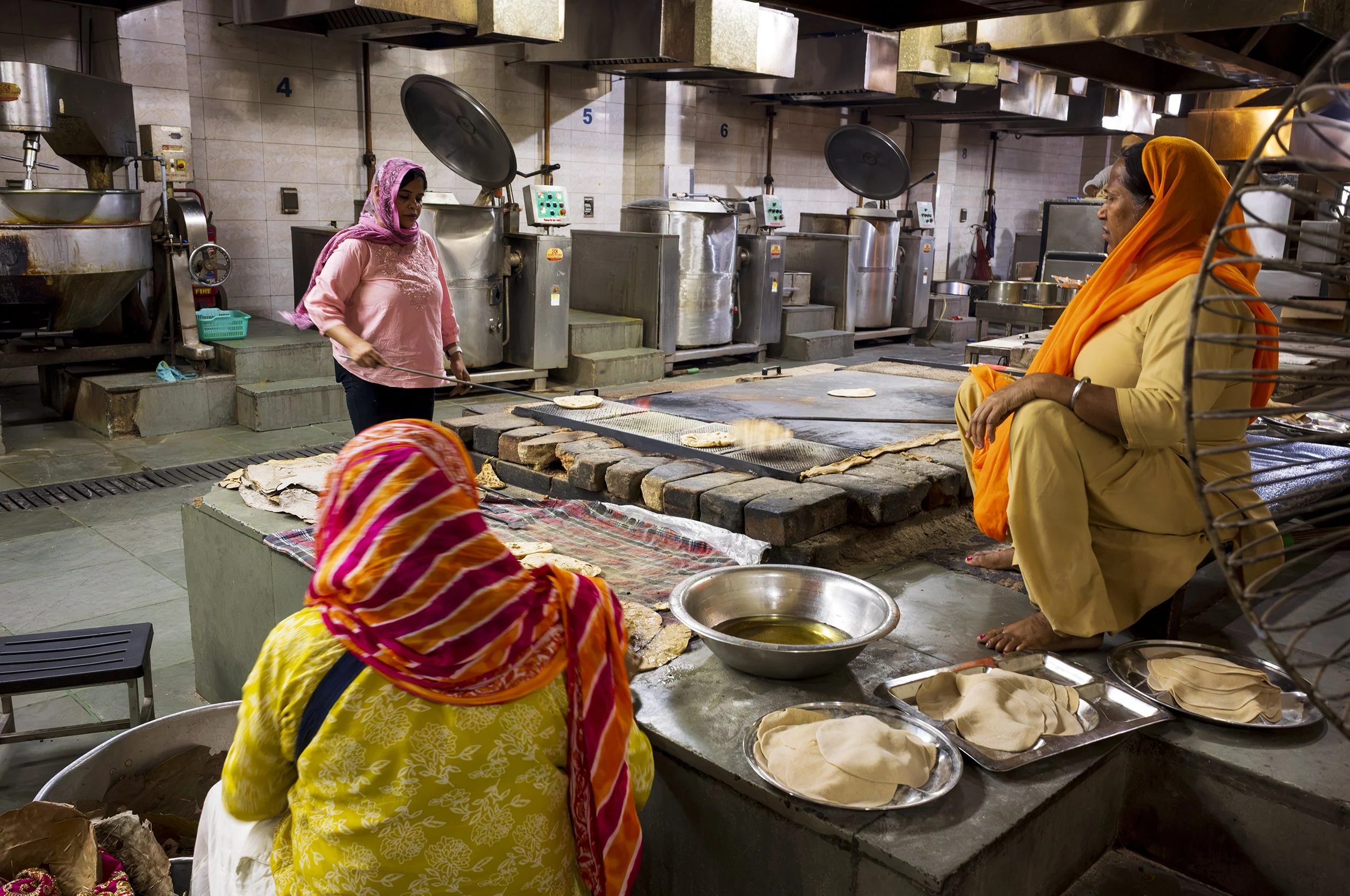 Cooking roti, kitchen heat