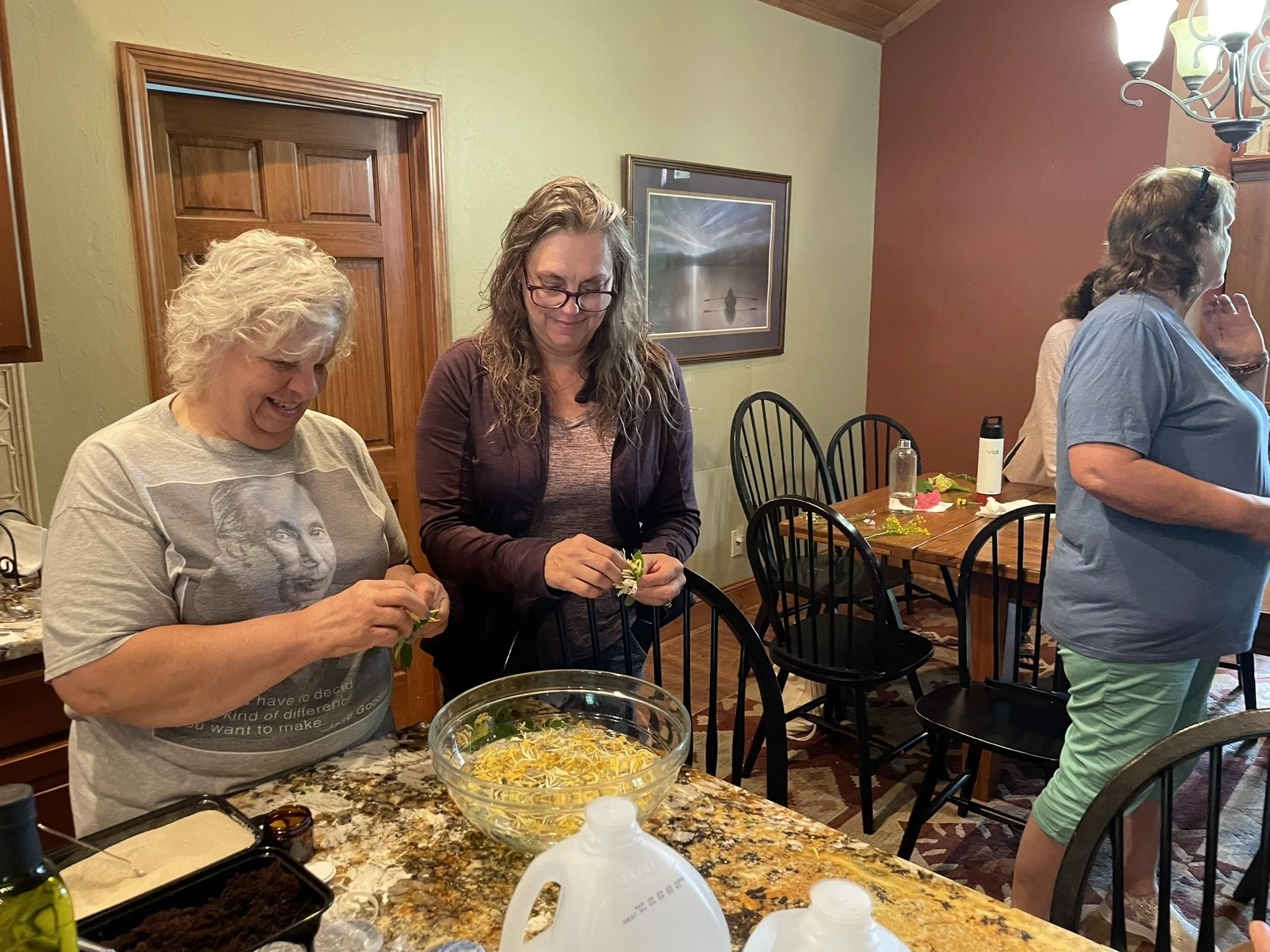 Students learning to prepare flower essence remedies during our Brilliant Health Weekend Away Herbal Bootcamp
