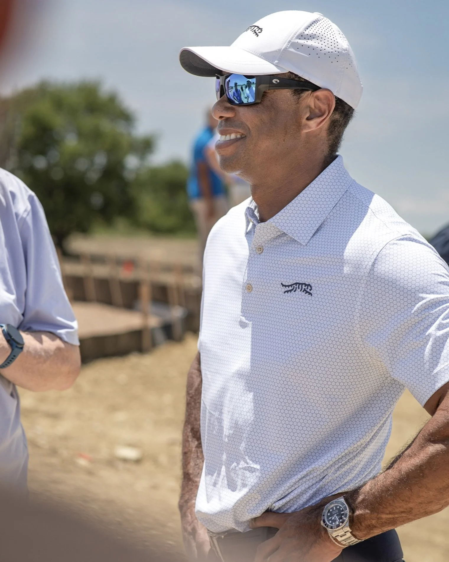 Tiger Woods professional golfer wearing Sun Day Red by Tiger Woods Photographed by Houston Photographer Katie Park.
