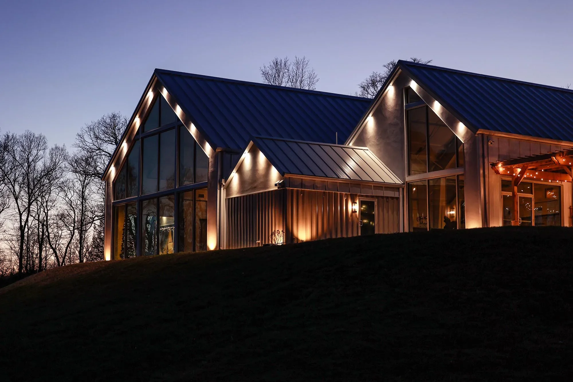 Illuminated wedding venue at sunset