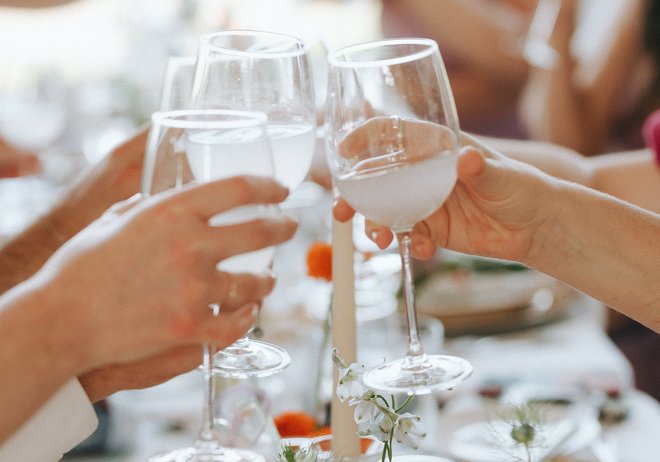 Guests toasting at milestone celebration