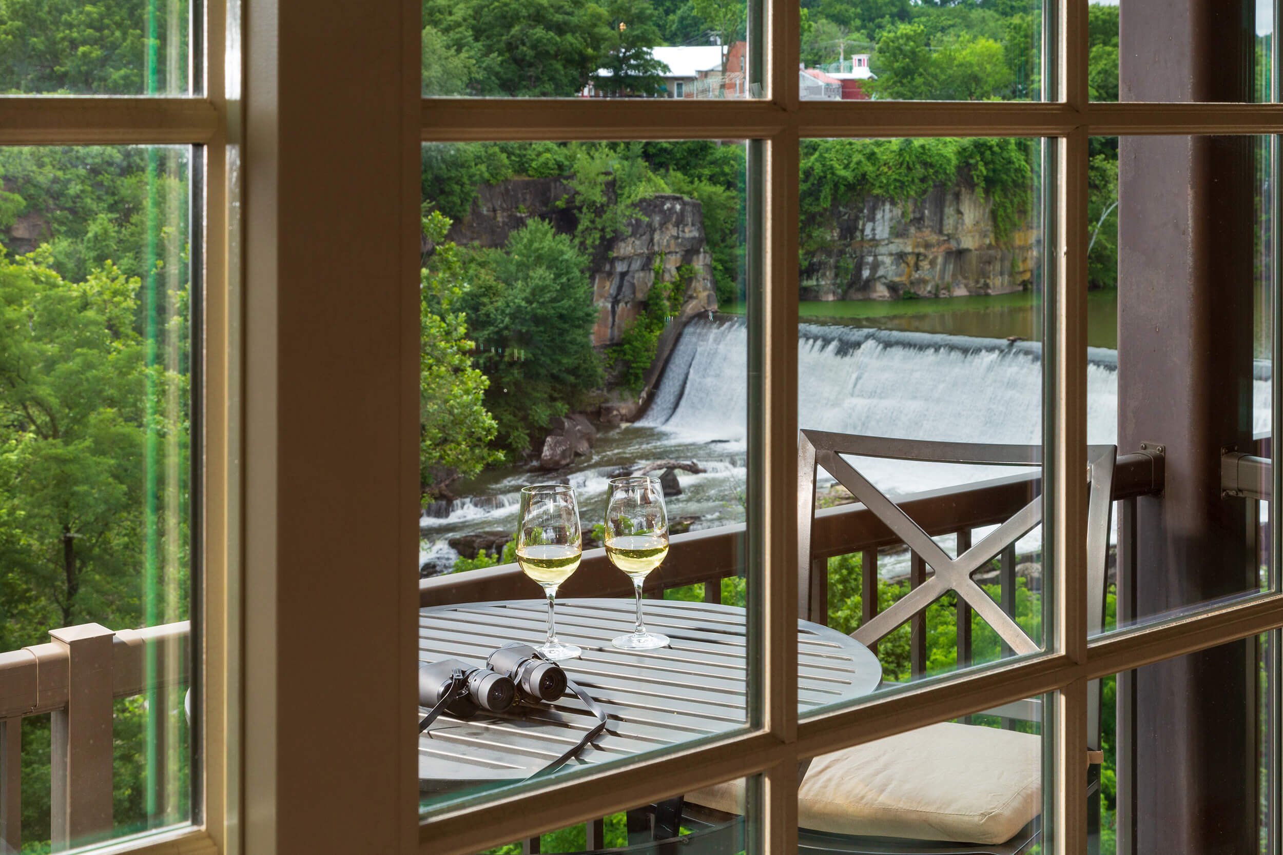 The balcony view of the Esopus Waterfall in a King Deluxe room at Diamond Mills hotel in Saugerties, NY