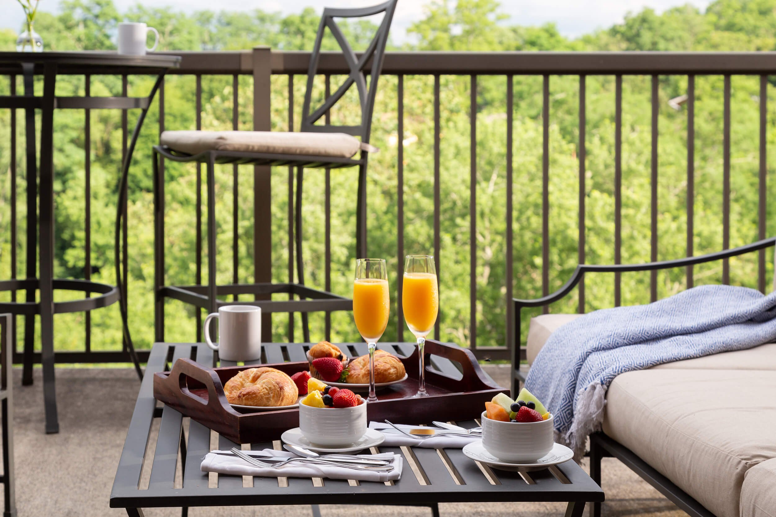 The balcony overlooking the Esopus Waterfall in the Esopus Suite at Diamond Mills hotel in Saugerties, NY