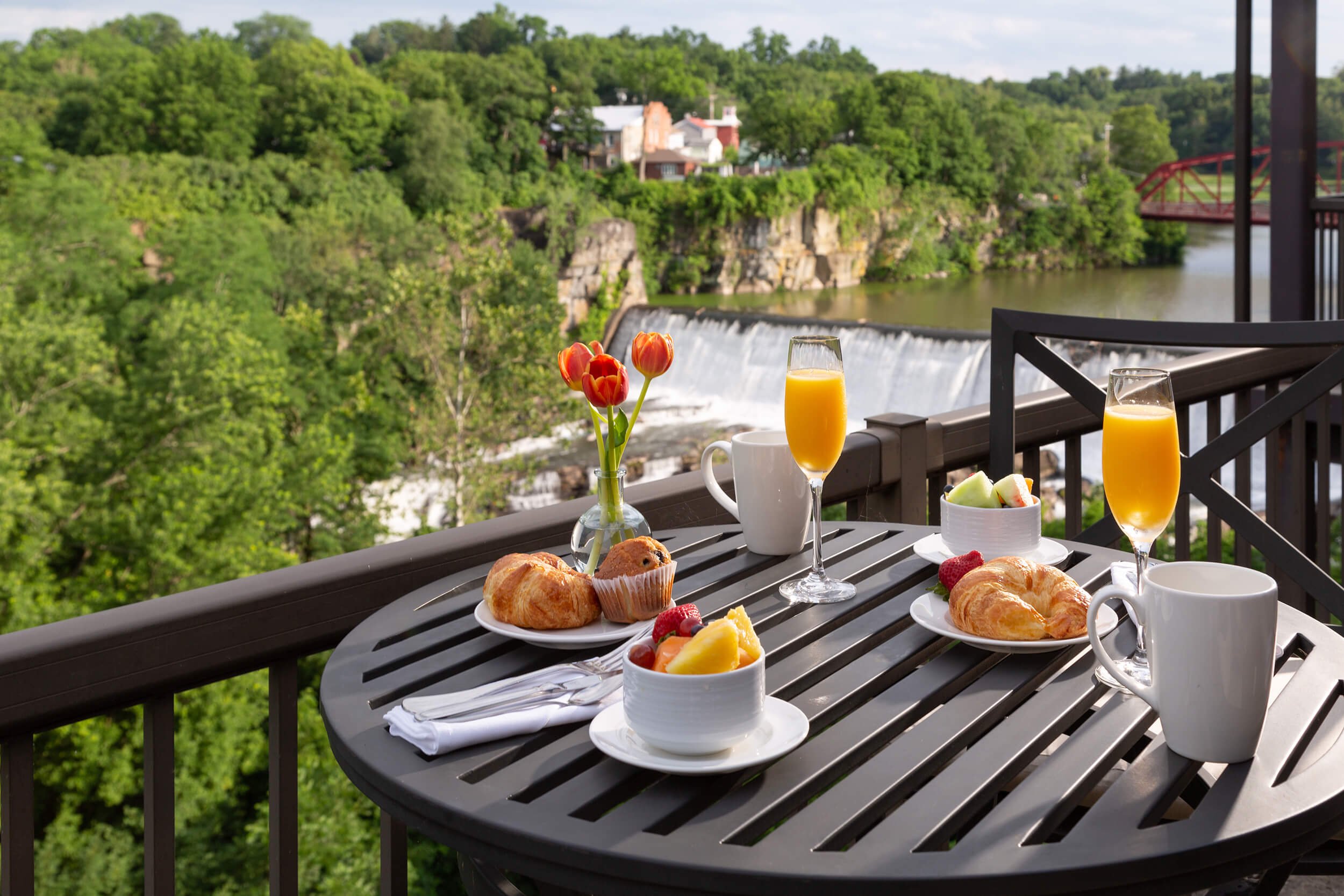 Breakfast on the balcony overlooking the Esopus Waterfall in the Tower Suite at Diamond Mills hotel in Saugerties, NY