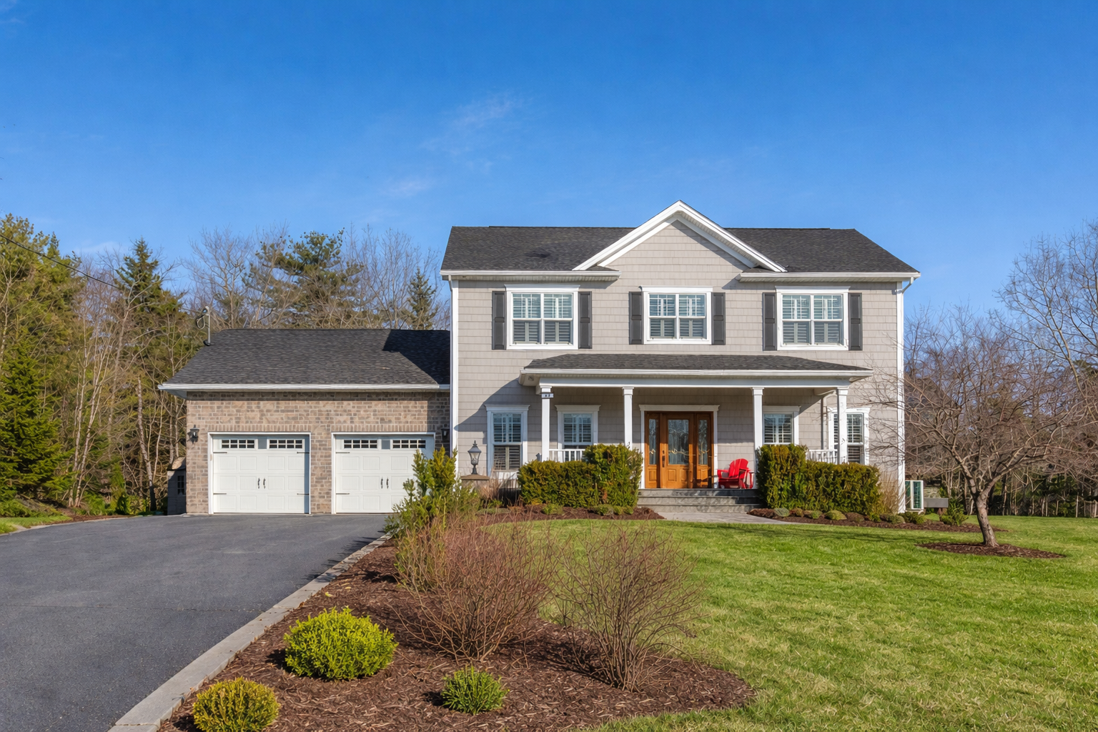 Suburban home with green front yard.png