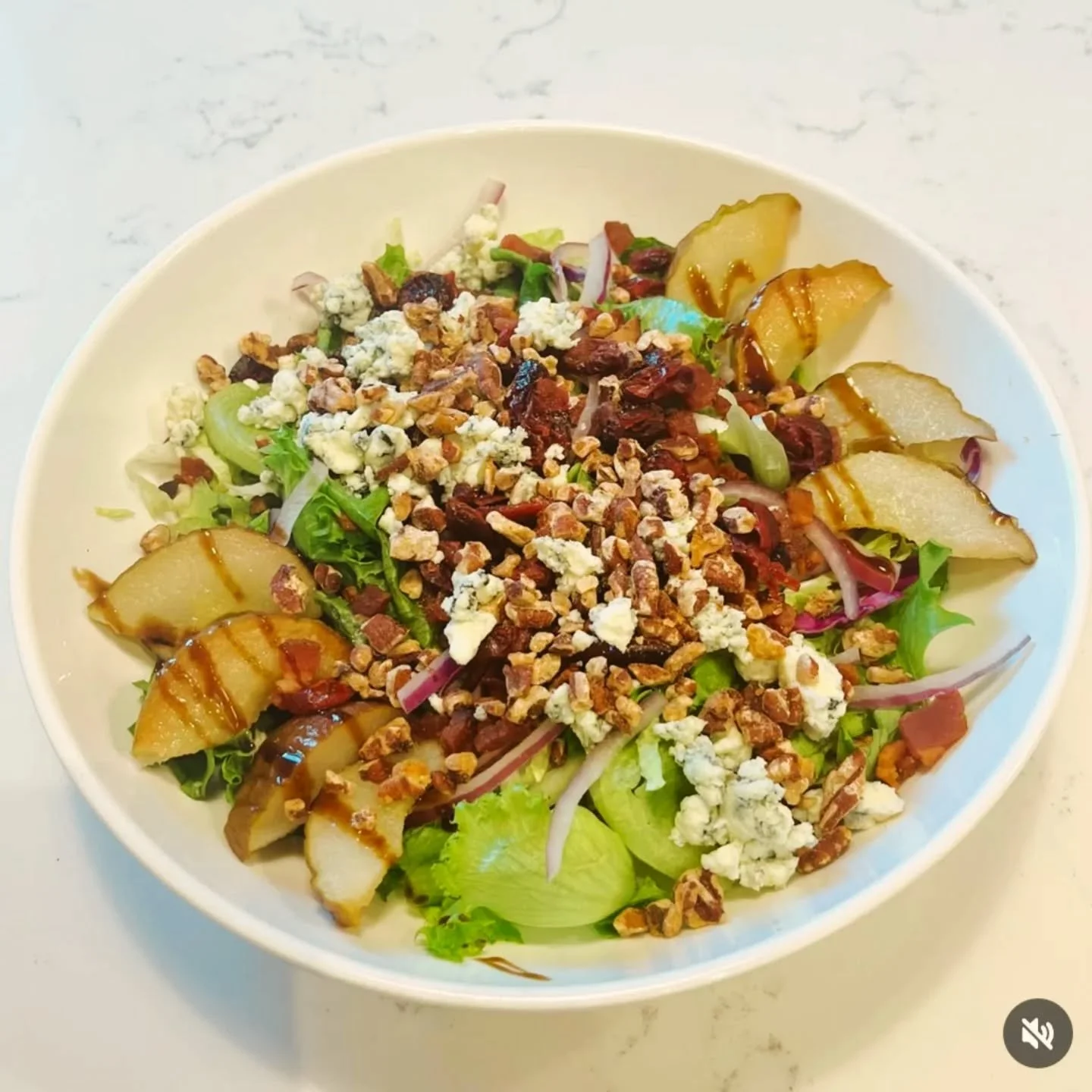 Our Pear &amp; Blue Cheese salad is back for the season! Featuring Seckel pears that we roast in honey &amp; butter and drizzle with balsamic glaze, tangy blue cheese, crispy @northcountrysmokehouse applewood smoked bacon, red onion, dried cranberrie