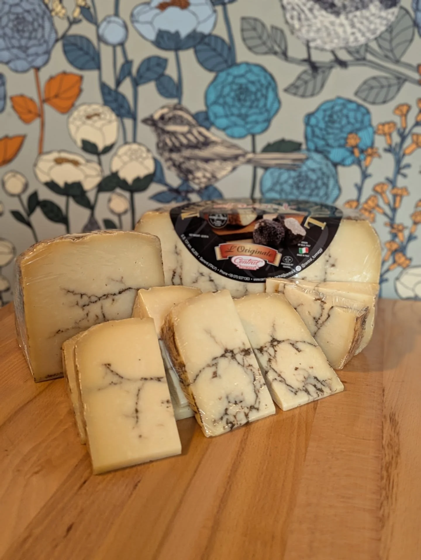 Moliterno al Tartufo is back in the case! This is a rich &amp; buttery sheep's milk cheese from Italy that's taken to the next level with the addition of black truffles which create beautiful ribbons throughout the paste. Pair with delicate slices of