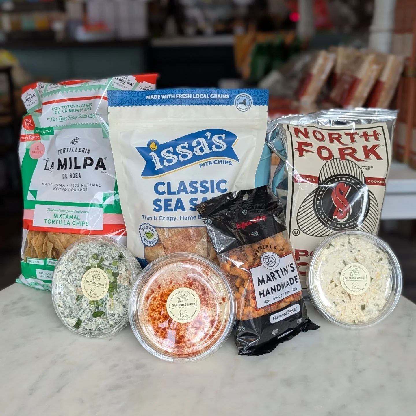 We're stocked and ready for your Superbowl viewing parties! Housemade dips, chips, local beers &amp; cider, and new NA bevs. Plus cheese, charcuterie, bread and lots of snacks! 🥨 🍺 🧀 🥖