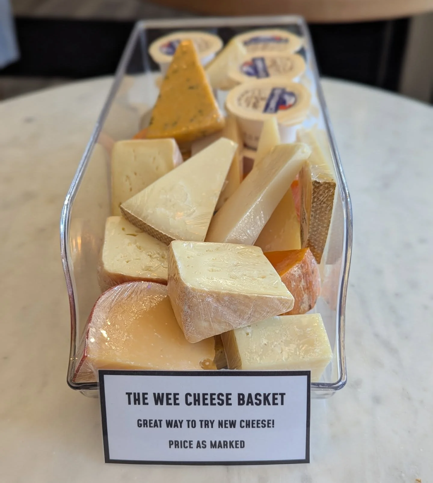 Have you seen our new Wee Cheese Basket!? Located in the grab &amp; go case and filled with sample size cuts, it's a great way to try a new-to-you cheese 🧀
