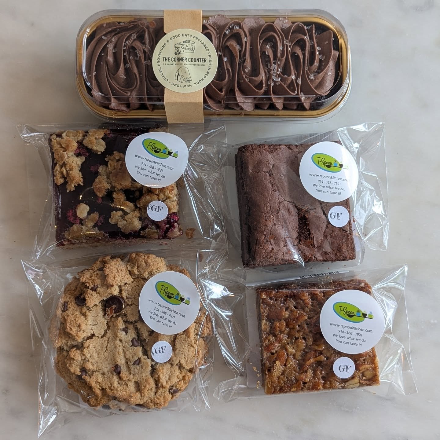Did you know we offer Gluten Free and Vegan treats!? Including our made in house Vegan Chocolate Cake.

We're also restocked on @tspoonkitchen baked goods 
*GF Brownie 
*GF Pecan Pie Bar
*VGF Chocolate Chip cookie 
*VGF Raspberry Oat Bar