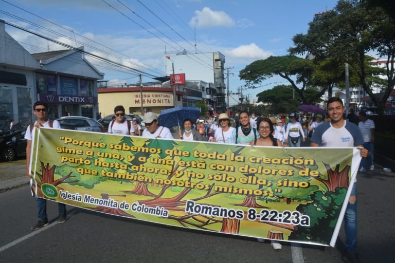   Congregants from Iglesia Menonita de Ibague march for the environment in the Carnival March last August. They have participated in the city-wide marches for over a decade.  Photo retrieved from Facebook.   