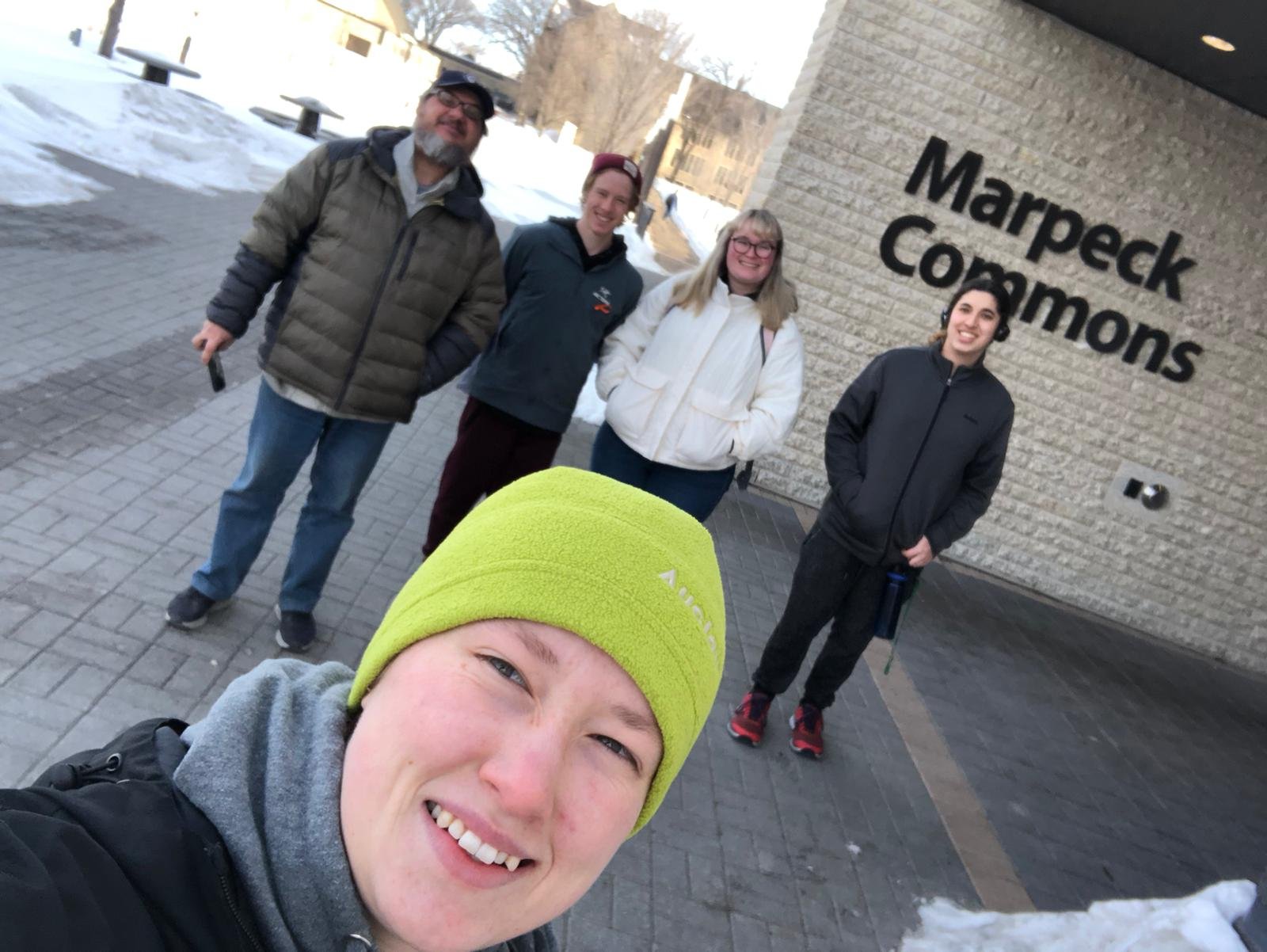   Tai Linklater (center) and members of the Peace and Sustainability Committee at CMU walked and ran in the Assiniboine Forest in Manitoba, Canada, on Tuesday morning. “It only made sense to pray about the protection of a natural and sacred landscape