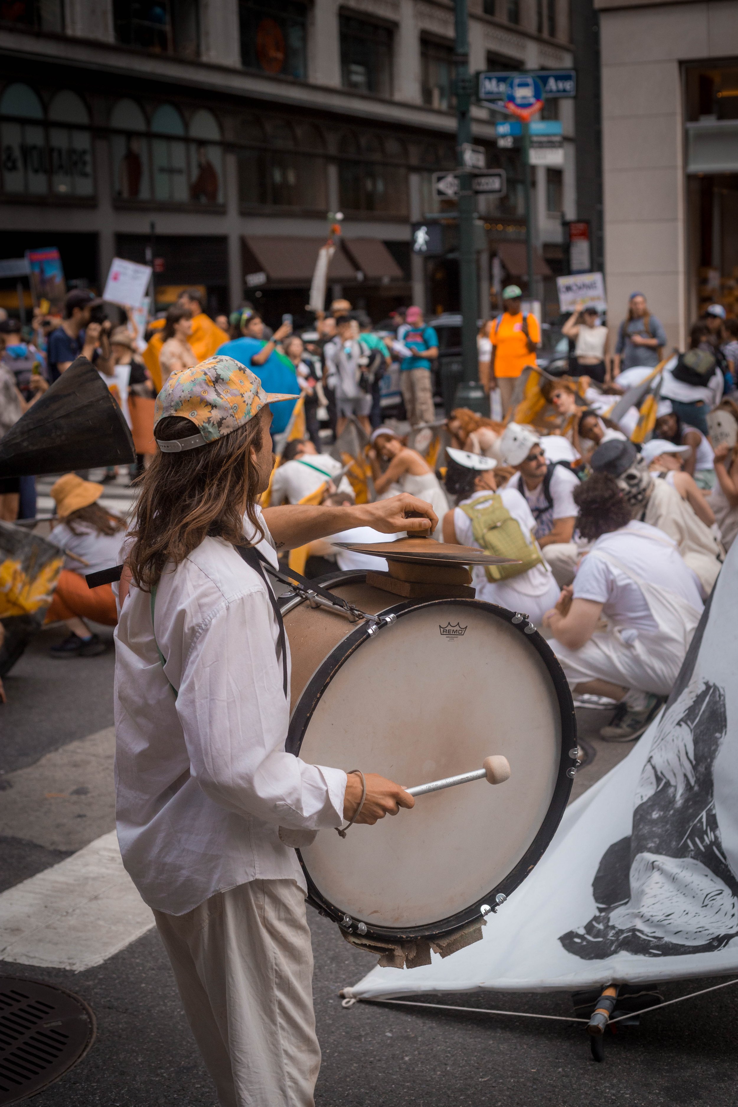  A drummer from a marching band affiliated with an anti-war demonstration that took place in the march. 