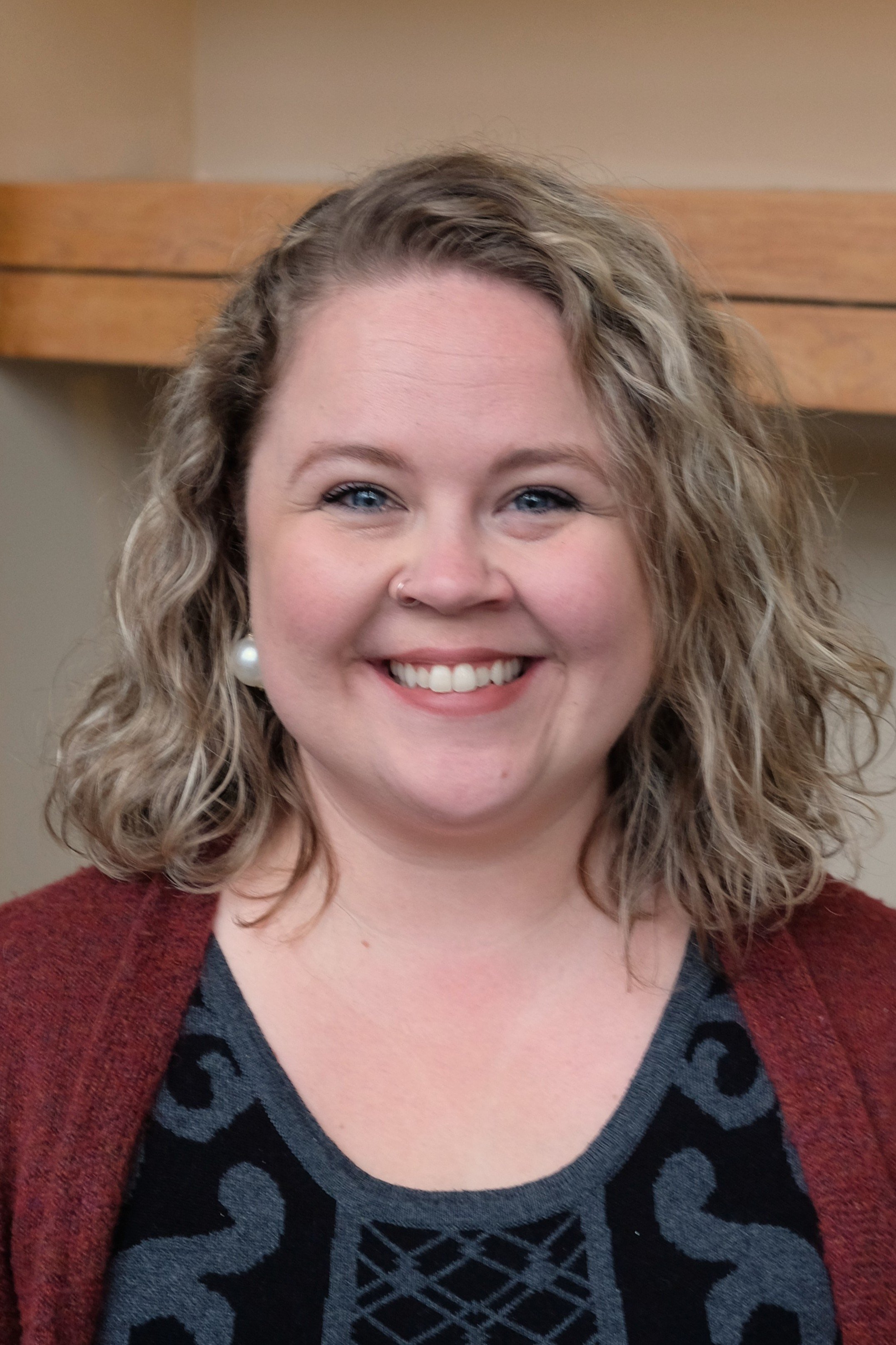 Headshot of Laura Puiras, church Deacon