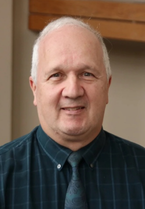A portrait of Dale Barker.