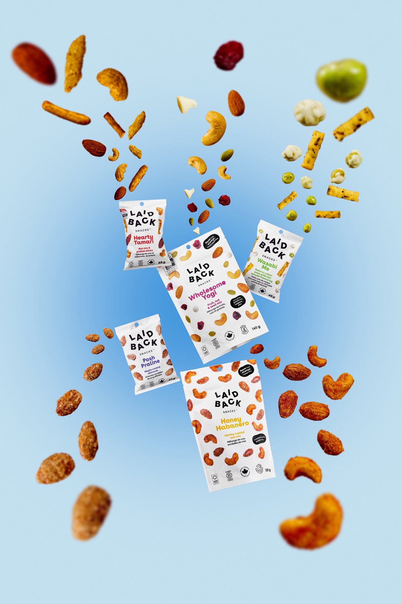 bags of nuts floating in the centre with nuts and seeds flying out of the bags