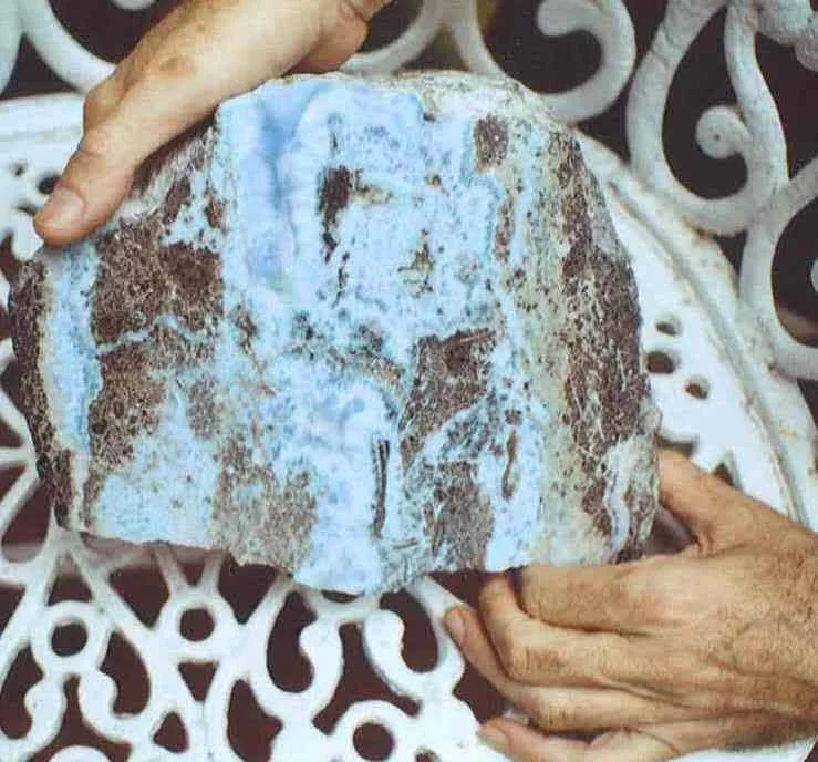 Natural raw Larimar stone from the Dominican Republic, showing its distinctive blue and white patterns.