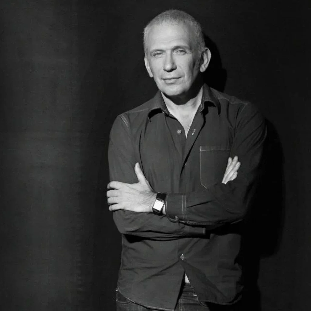 Portrait of French fashion designer Jean-Paul Gaultier, connected to TASO through a unique Larimar jewelry creation.