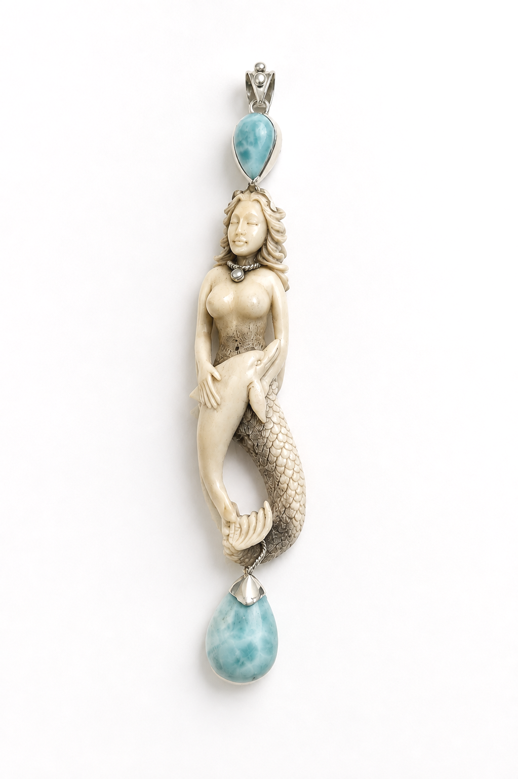 Original mermaid pendant by Taso Haidemenakis, featuring a sculptural mermaid form with blue gemstone details.