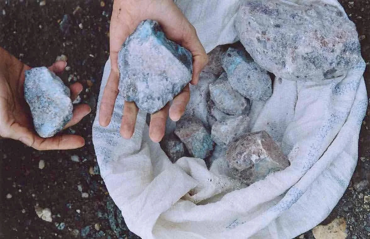 Raw Larimar stones from the Dominican Republic before being transformed into TASO jewelry.