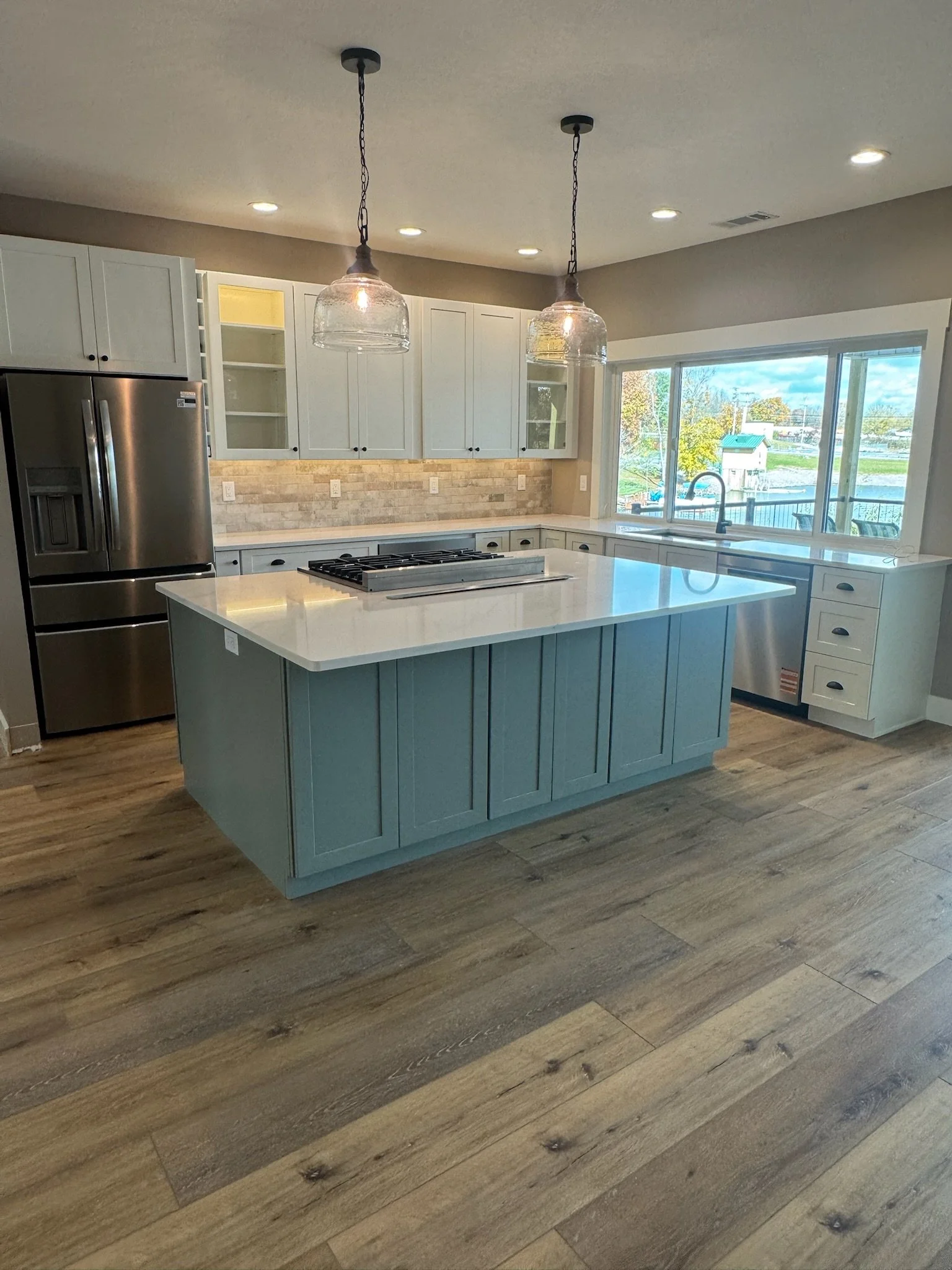 Kitchen by New Age Homes Co.