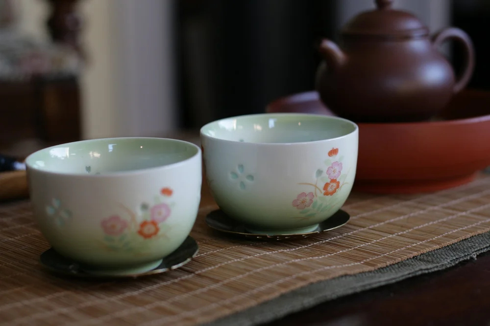 52. Vintage Arita yaki flower stamp teacup with hotaru-de openwork