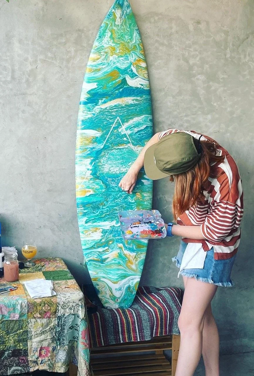 Painting surfboards.JPG