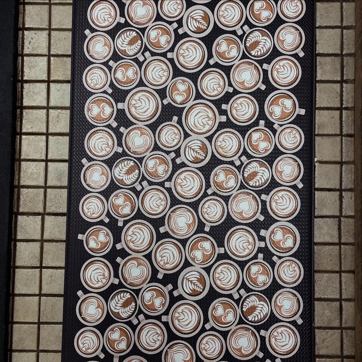 One of my loyal customers surprised me with a latte art floor mat for the espresso bar. I'm on my feet 10-12 hours a day, and this thoughtful gift will help alleviate my daily fatigue. It's not just cute - it's a reminder that I have the best custome