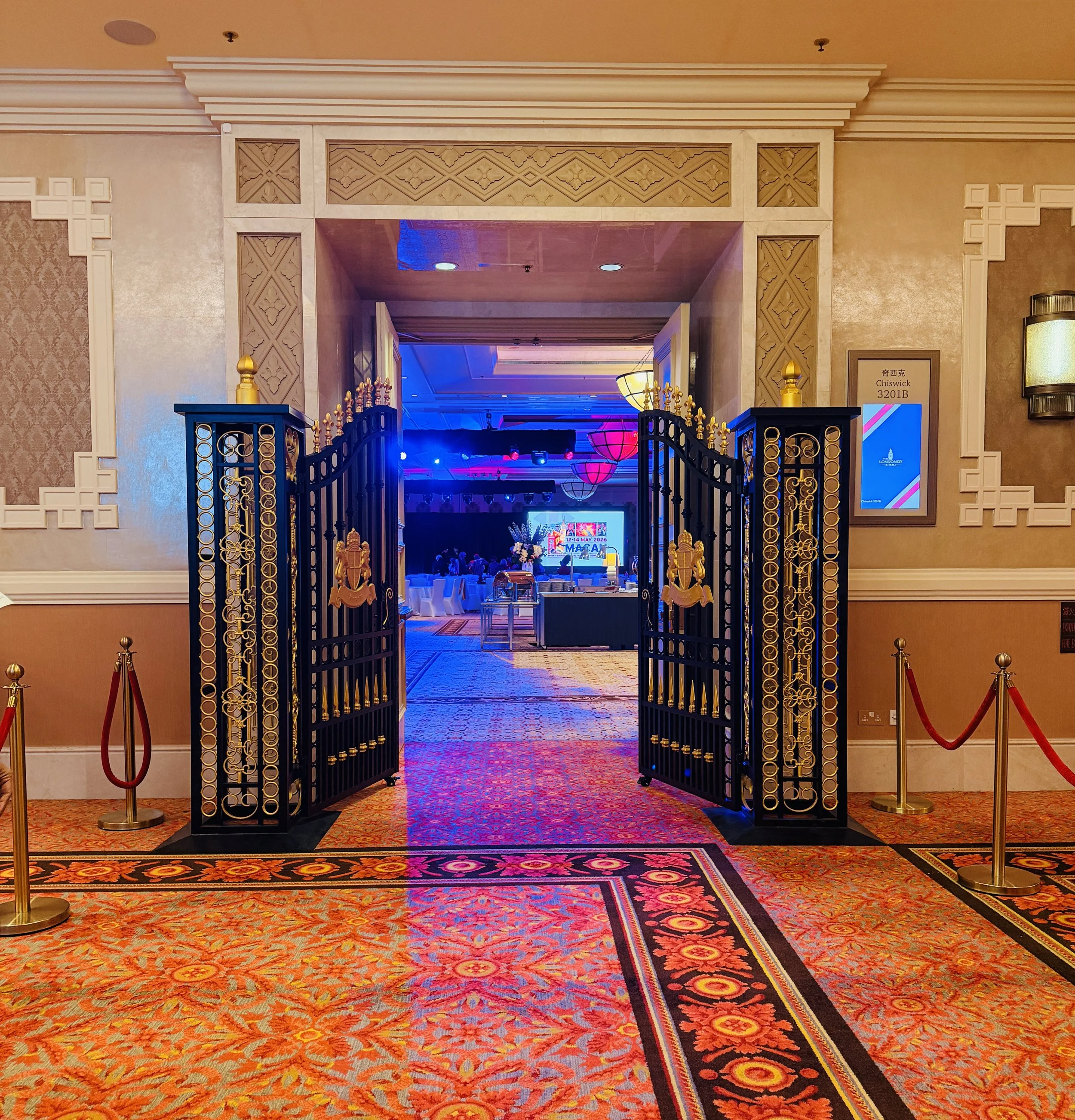 Full venue styling for Sport Group Annual Partner Conference with bespoke centrepieces, stage and event entrance installation