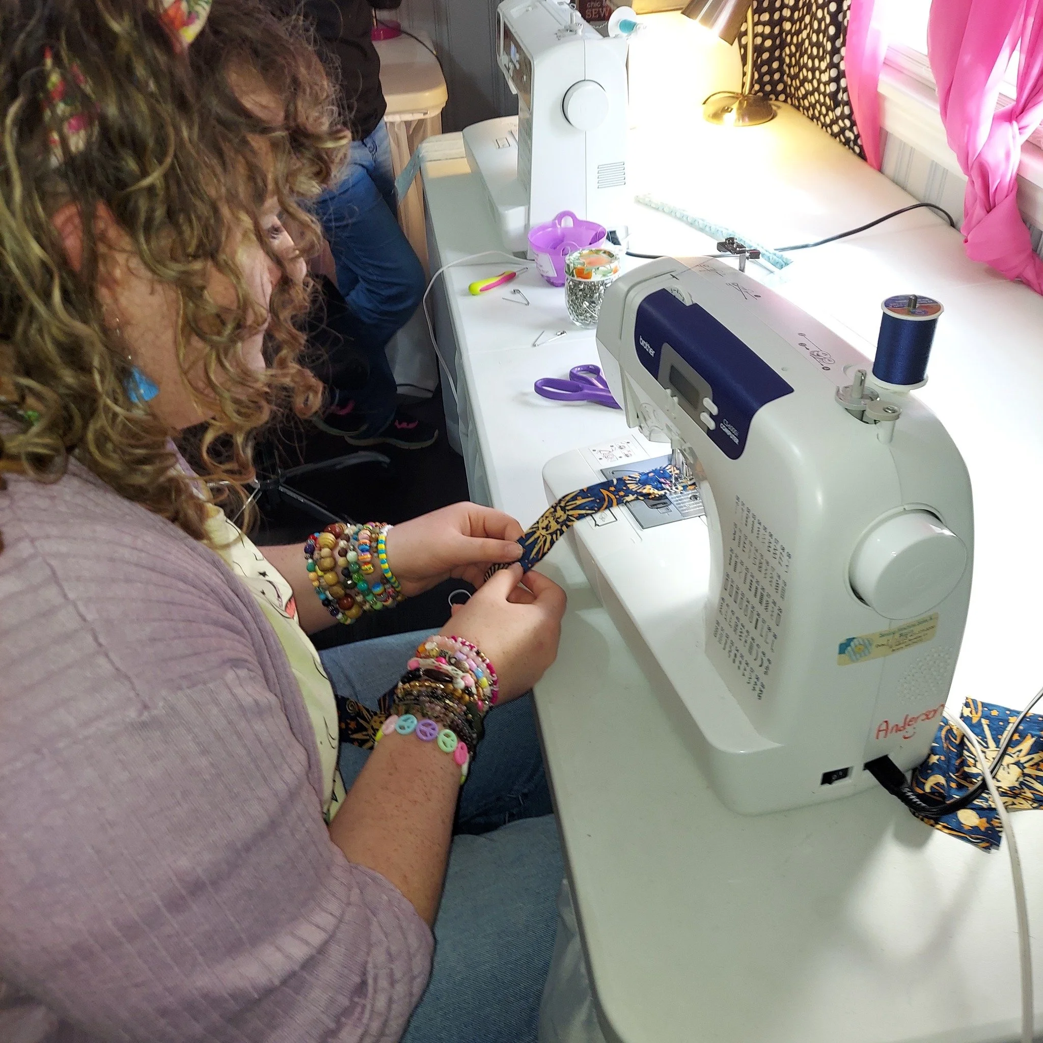 girl sewing.jpeg