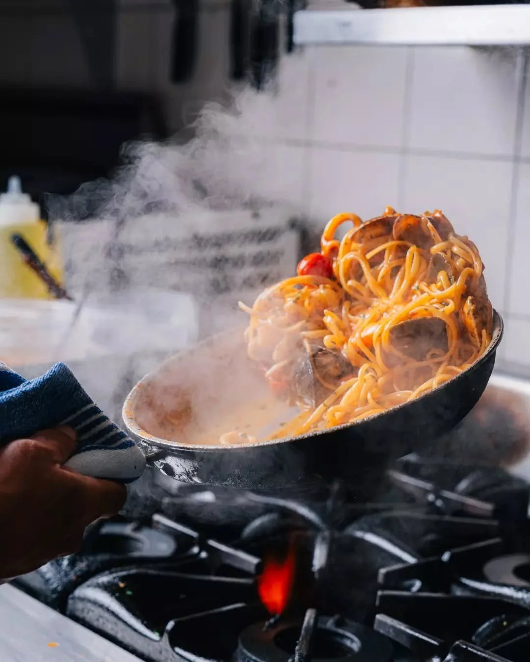 Steam rising, sauce simmering, and pasta dancing in the pan. It&rsquo;s the kind of comfort only Italian food can bring. Come share it with us at T&Aacute;VOLA. 🍝❤️