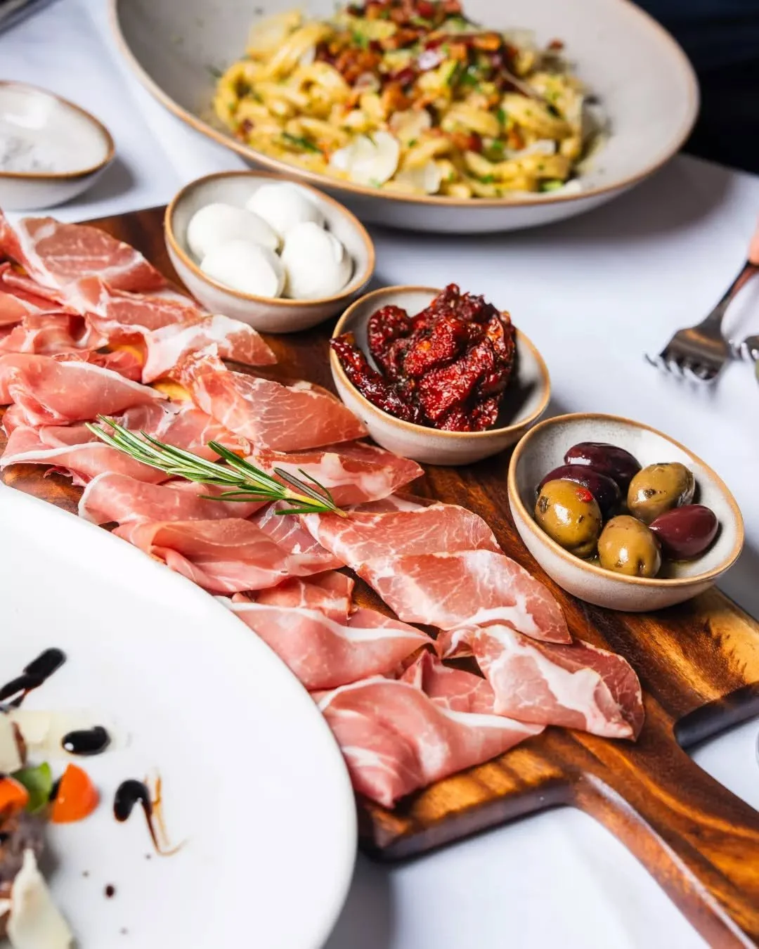 This is our favourite way to begin the meal 🥰

Tagliere della T&Aacute;VOLA, a generous spread of cured meats, olives, bocconcini, focaccina and fried pizza, made to be passed around and enjoyed together.

We&rsquo;ll bring it out when you&rsquo;re 