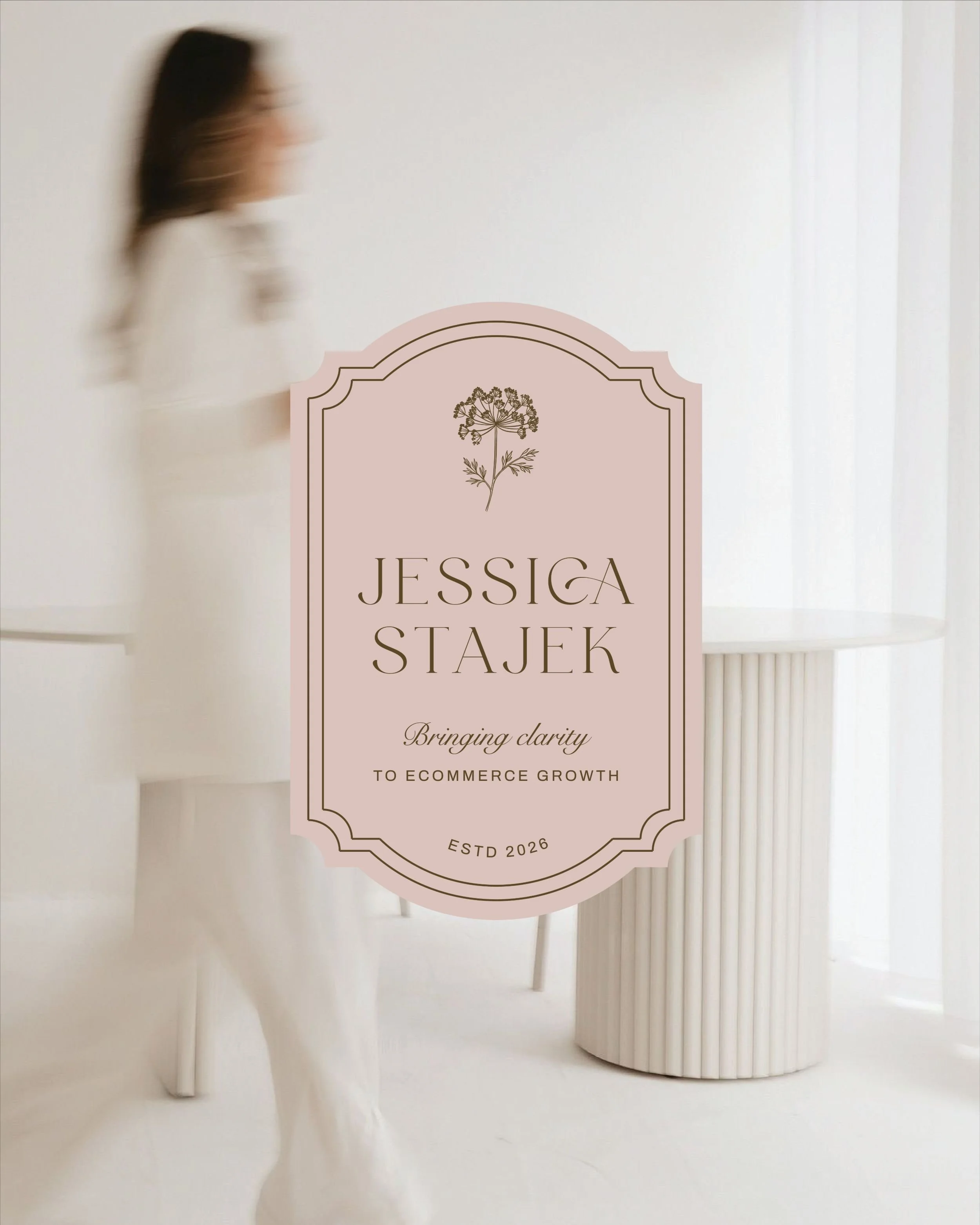 Custom monogram logo design for ecommerce consultant Jessica Stajek featuring bespoke letterform customisation and elegant typography.