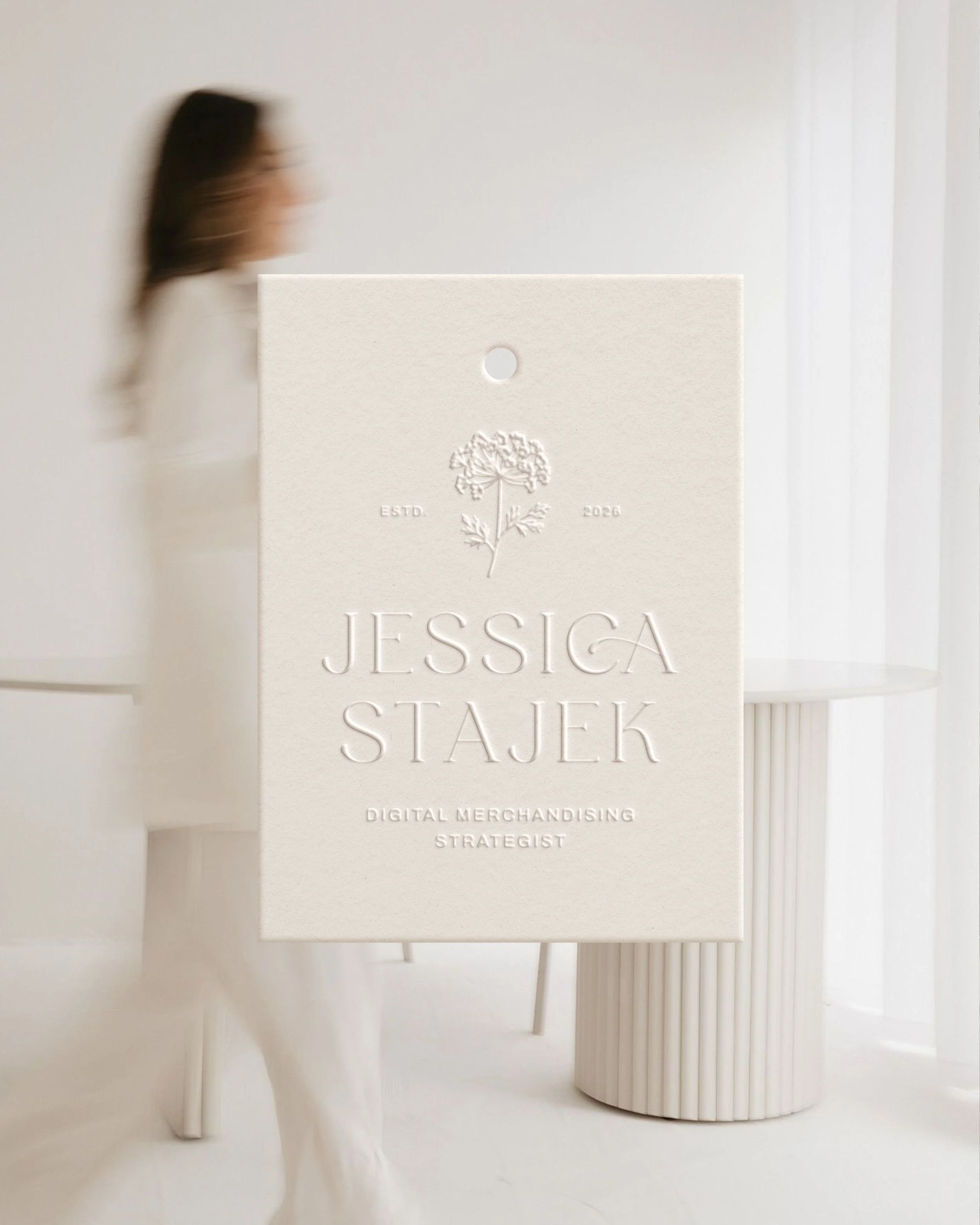 Brand strategy and visual identity design for a digital merchandising consultant with premium, feminine, and professional branding.