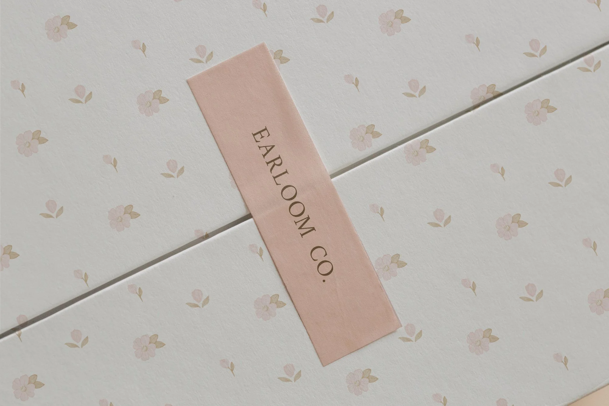 tissue paper and sticker design mockup for feminine hand painted florals earloom co sunday lane studio