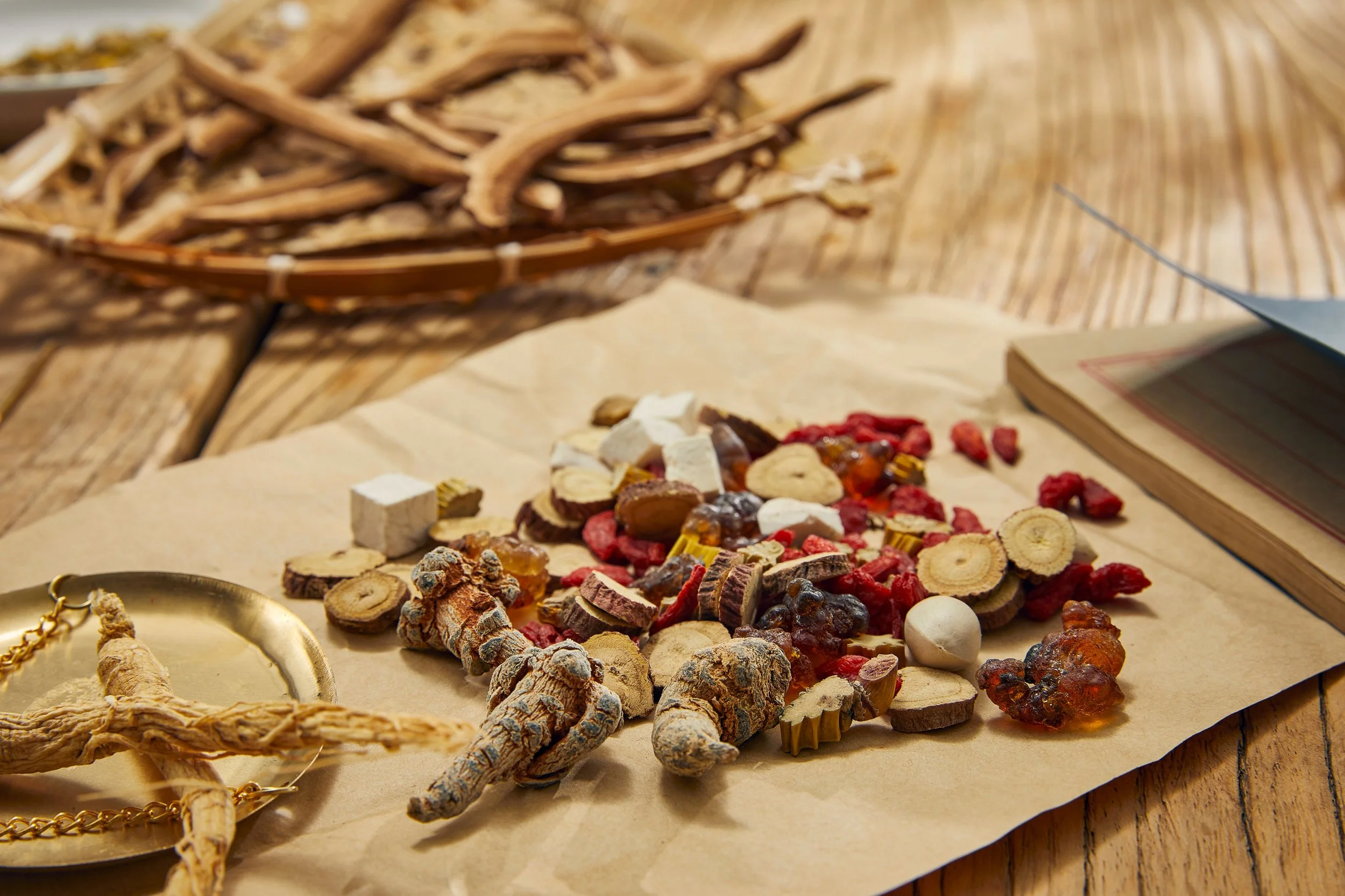 Chinese herbal prescriptions prepared with a selection of traditional Chinese herbs and natural ingredients used in personalised TCM treatment