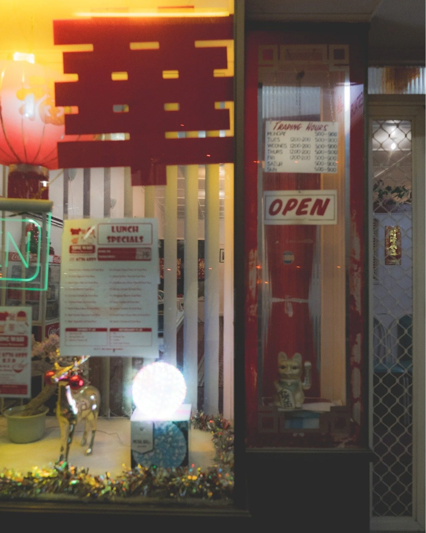 Every country town has one.
Neon lights. Laminated menus. Sweet and sour everything.