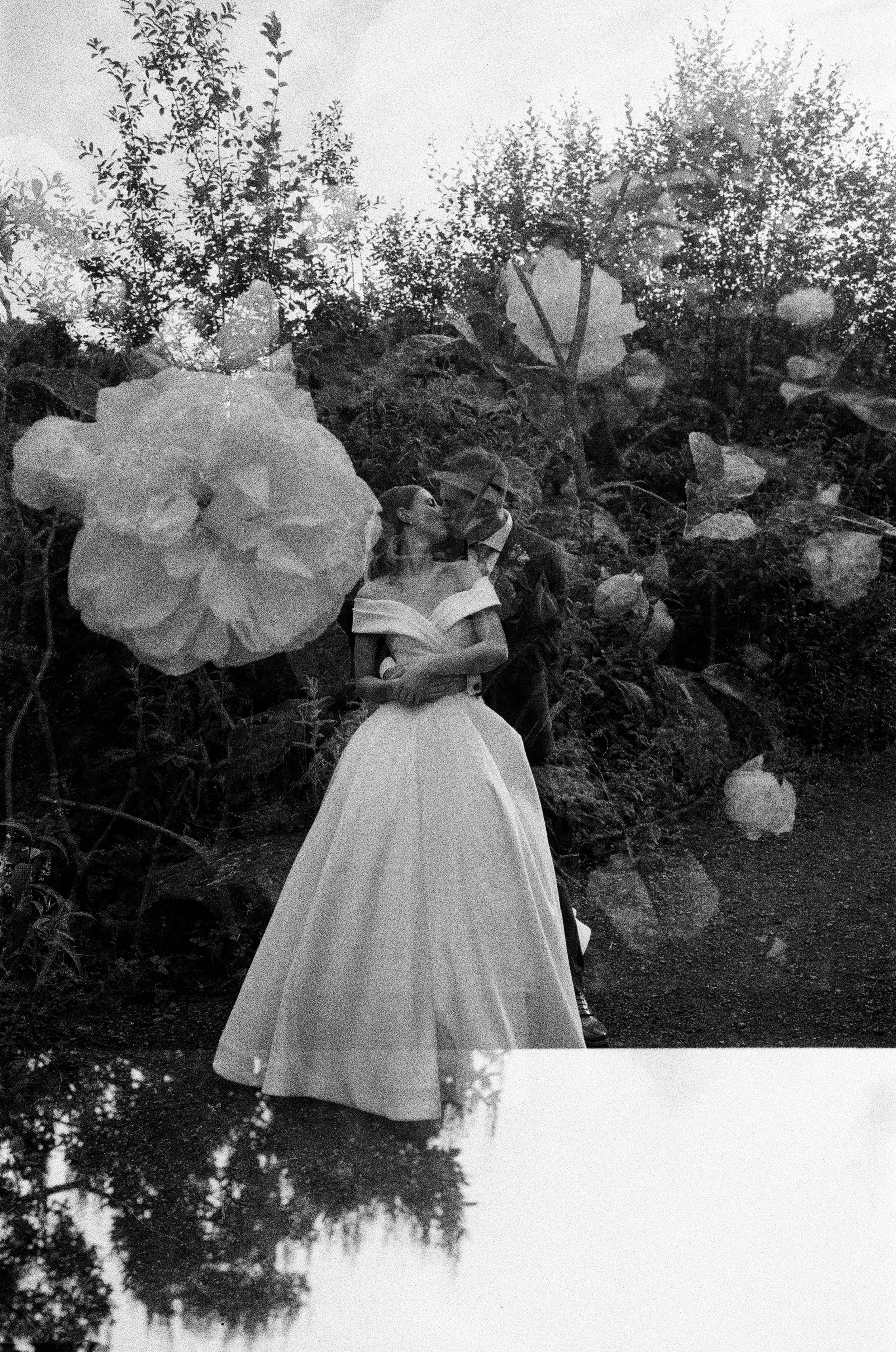 Black and white double exposure photo with roses