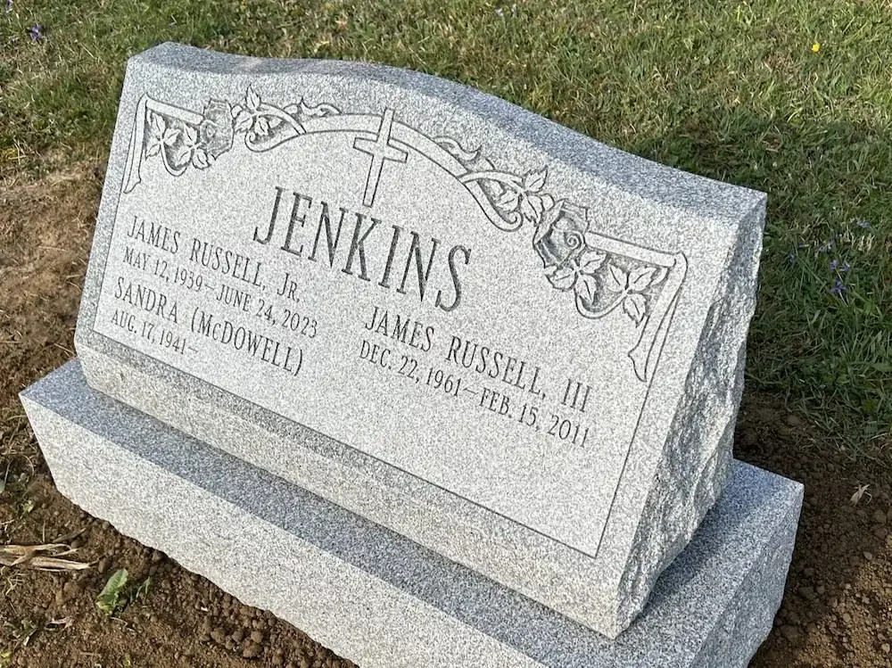 Headstone with smooth top and rocky sides