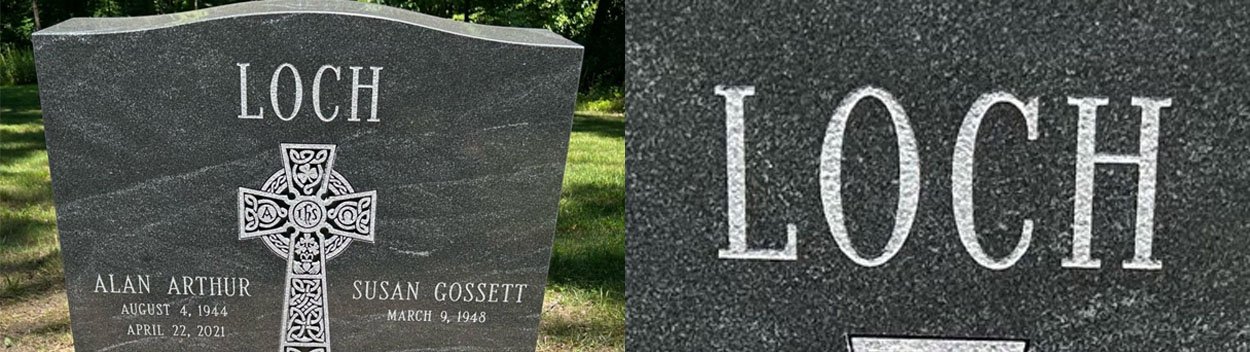 Close-up of a gray granite headstone with the surname "Loch" and a Celtic cross engraved on it, in a grassy cemetery.