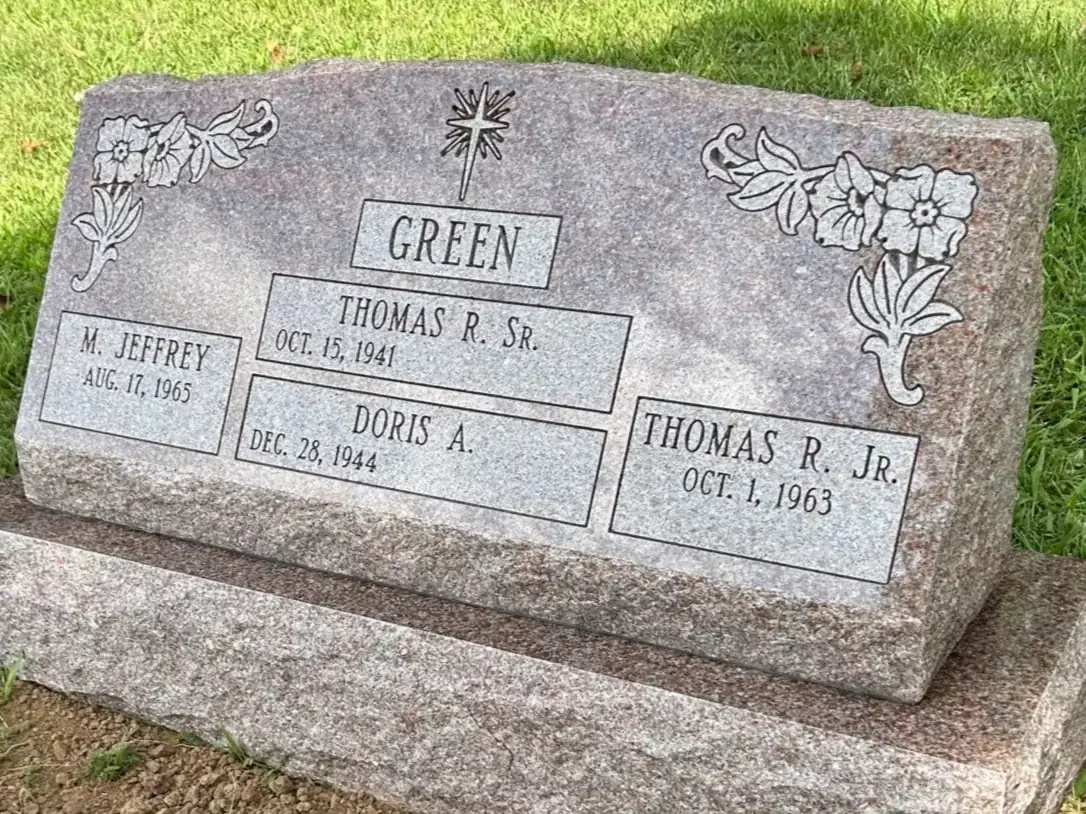 Headstone with top and sides rocky looking