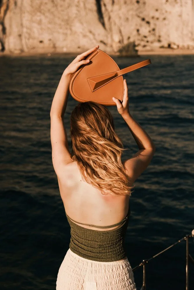 FASHION CAMPAIGN SHOES BAGS ON BOAT